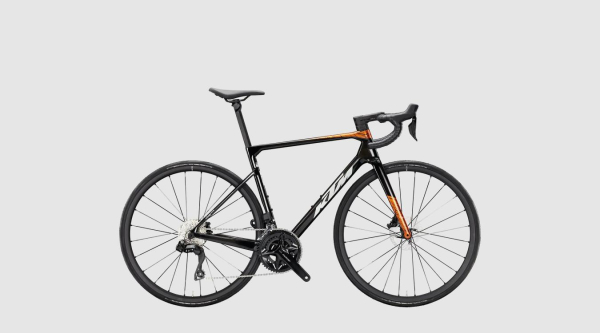 KTM Revelator Alto Elite Di2 Országúti Kerékpár - Carbon+Burnt Orange - fekete - narancssárga