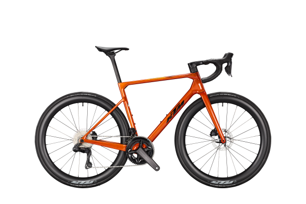 KTM REVELATOR ALTO MASTER Di2 PM BURNT ORANGE 28" 2027 Országúti Kerékpár - narancssárga